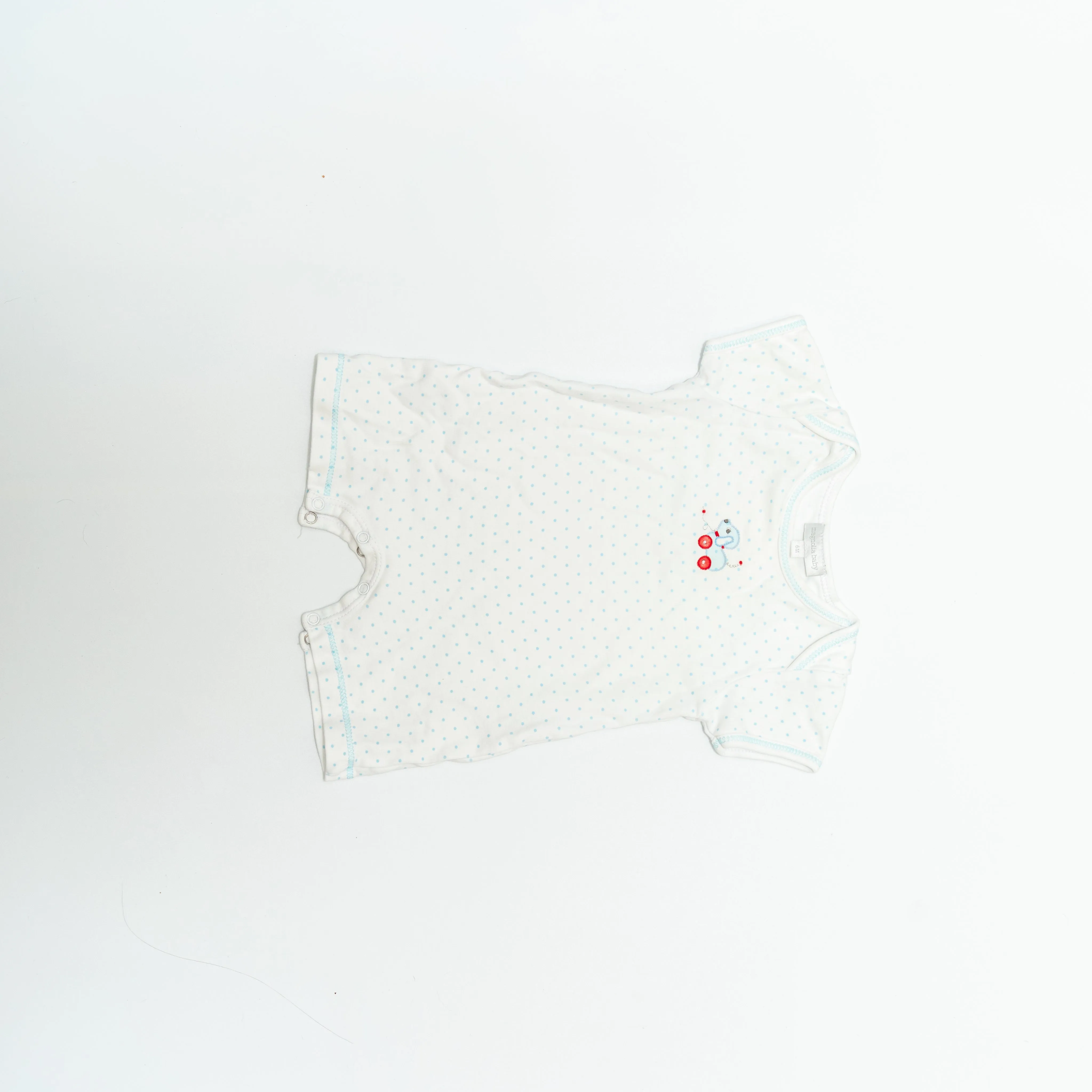 Magnolia Baby Onesie